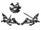 KIT PLATINES RECULÉES GP EVO POUR APRILIA RS660 / TUONO 660 (2020/2024) (PASSAGE DE VITESSES STANDARD ET INVERSÉ) AVEC PROTECTEUR DE TALON EN ALUMINIUM (NOIR)